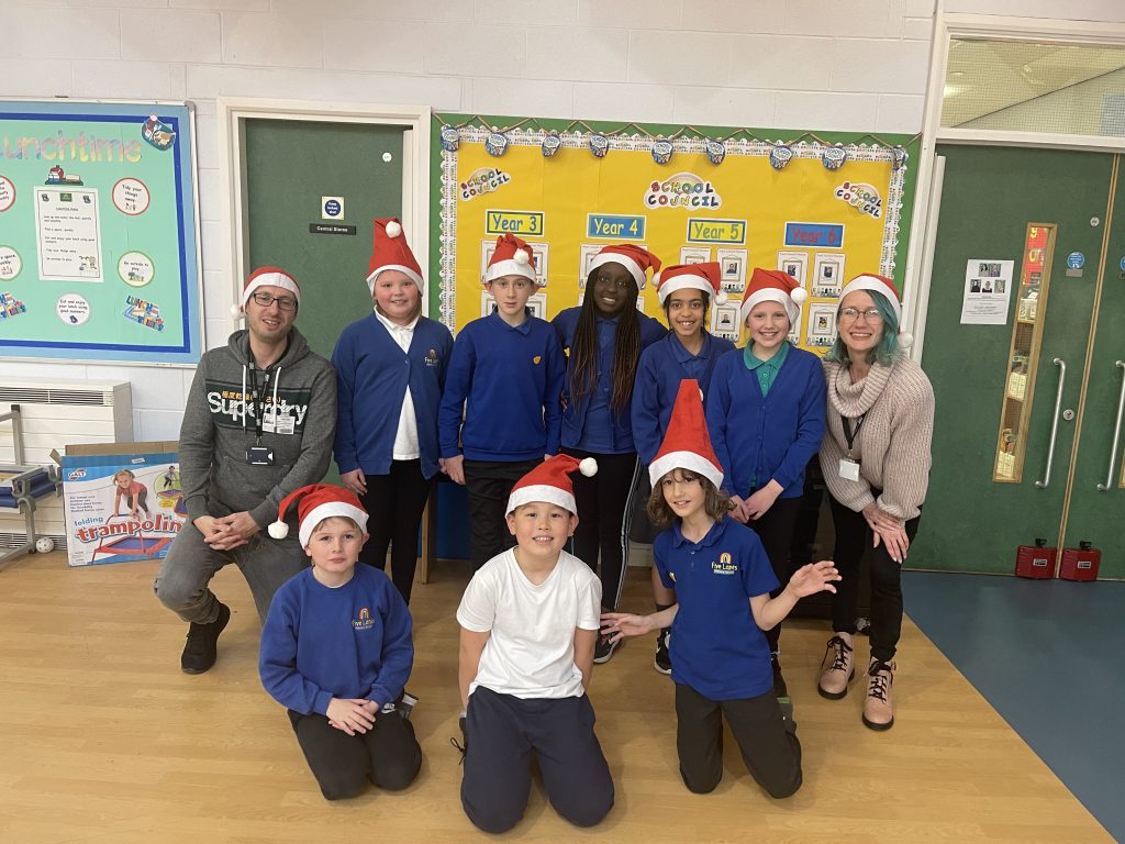 School Children Become Elves in Festive Fundraiser to Support Homeless ...